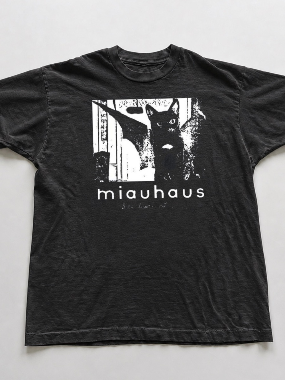 Black Tee with White 'miauhau s' Cat Graphic